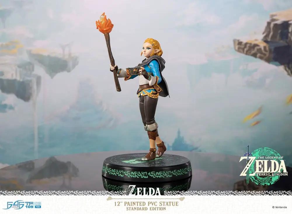Zelda PVC action figure holding torch from The Legend of Zelda: Tears of the Kingdom, 31 cm, on ornate base.