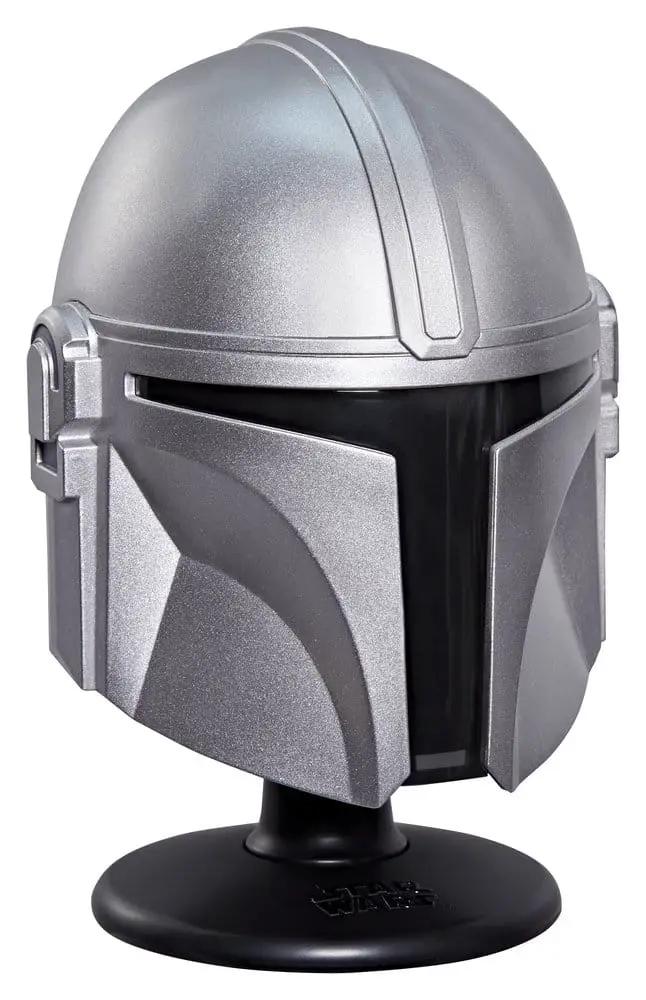 Star Wars Mandalorian helmet collectible; metallic silver finish with black visor on a black display stand