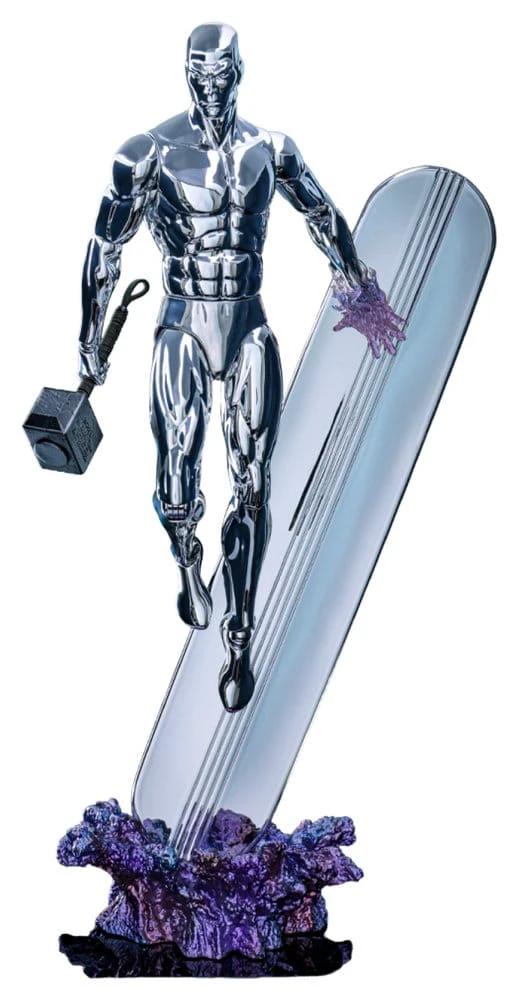 Marvel Figura 1/6 Silver Surfer action figure with chrome finish, surfboard, and purple rocky base.