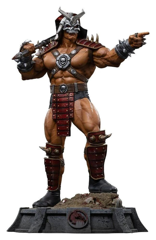 Mortal Kombat Shao Kahn 1/10 Art Scale statue; muscular figure in red armor with spikes, standing on base with MK logo.