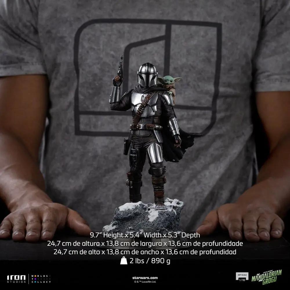 IRON STUDIOS Mandalorian and Grogu 1/10 statue, 25 cm tall, metallic armor with Grogu perched on his shoulder.