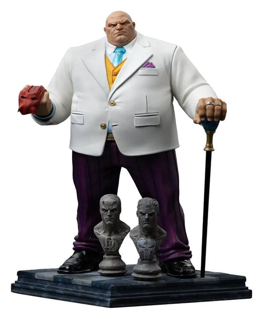 Iron Studios Marvel Kingpin 1/10 Art Scale statue, white suit with purple pants and yellow vest, holding a cane on a display base.