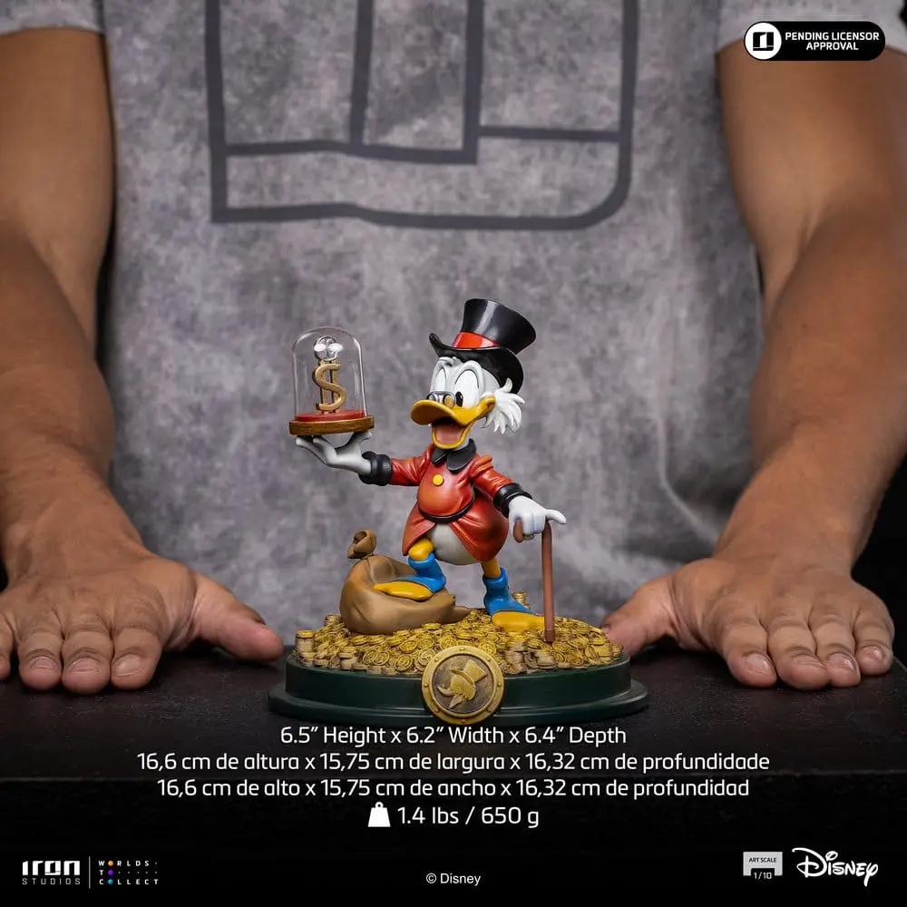 Iron Studios Duck Tales Estatua 1/10 Art Scale Uncle Scrooge McDuck statue on coin pile, 17 cm tall.