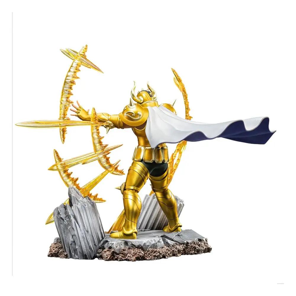 Saint Seiya Taurus Aldebaran 1/10 Art Scale action figure by IRON STUDIOS, gold armor with white cape on rocky base