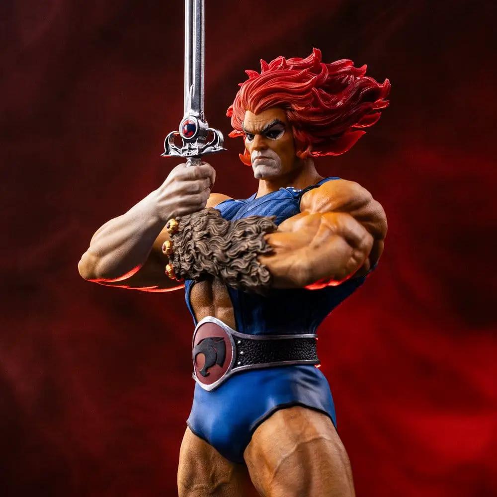 Iron Studios Lion-O ThunderCats 1/10 statue, blue outfit, red hair, sword raised, 35 cm tall
