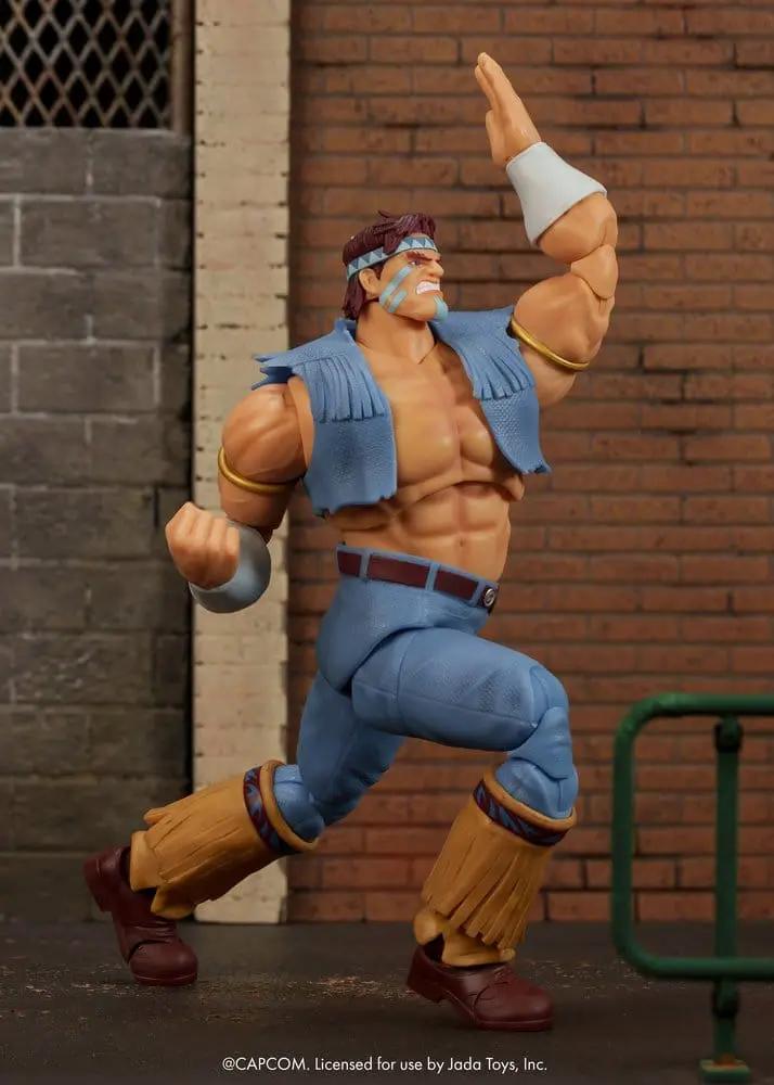 Figura de Hawk de Street Fighter por Jada Toys; 1/12, musculoso con chaleco azul, pantalones azules y botas marrones