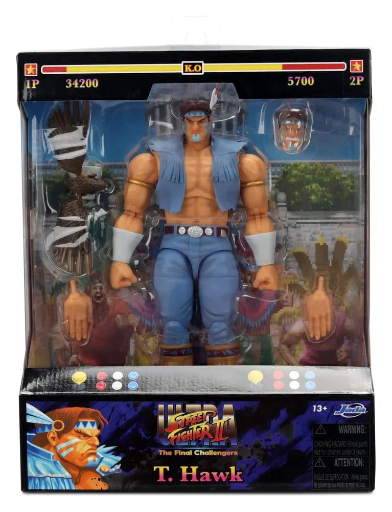 Figura de acción T. Hawk de Street Fighter II, escala 1/12 (20 cm), de Jada Toys, con manos intercambiables y ropa azul.