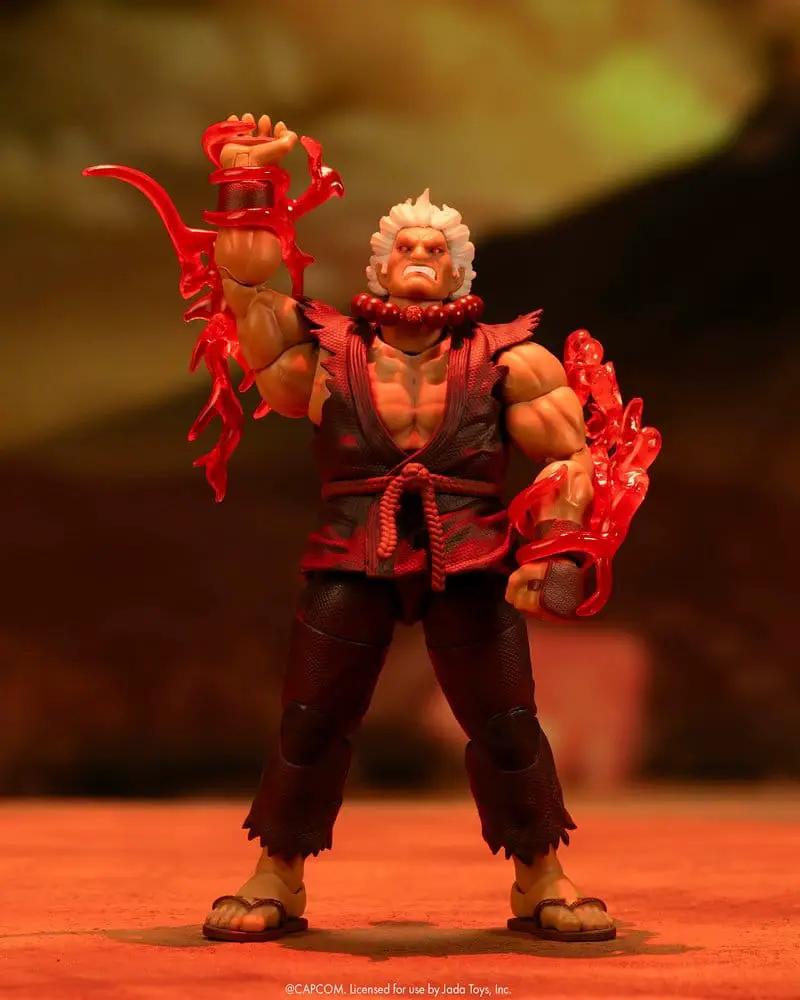 Figura de acción Akuma de Street Fighter, 15 cm, 1/12 escala, de Jada Toys, con efectos rojos de energía en brazos.