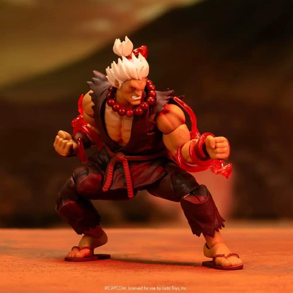 Figura de acción Akuma 1/12, 15 cm, de Ultra Street Fighter II por Jada Toys, traje rojo con accesorios rojos.