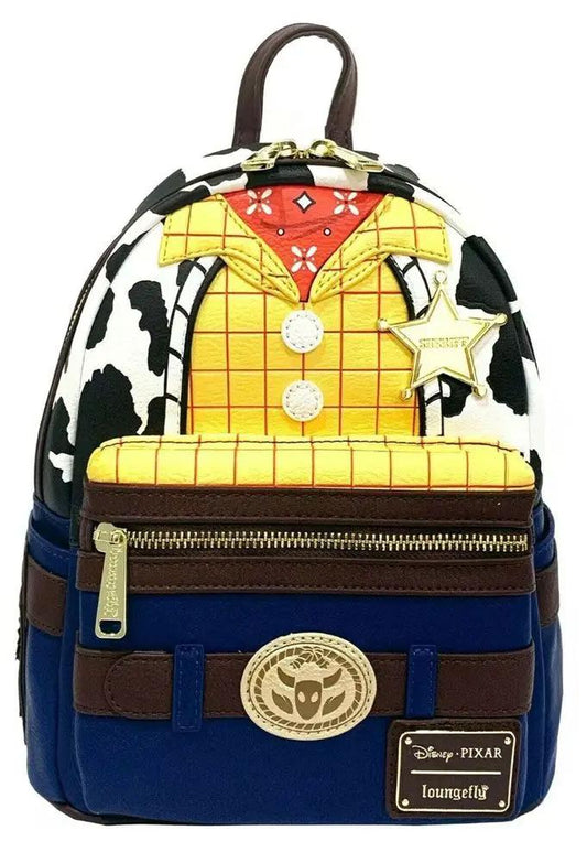 Loungefly Toy Story Woody backpack with blue base, cow-print sides, yellow plaid front, and gold hardware.