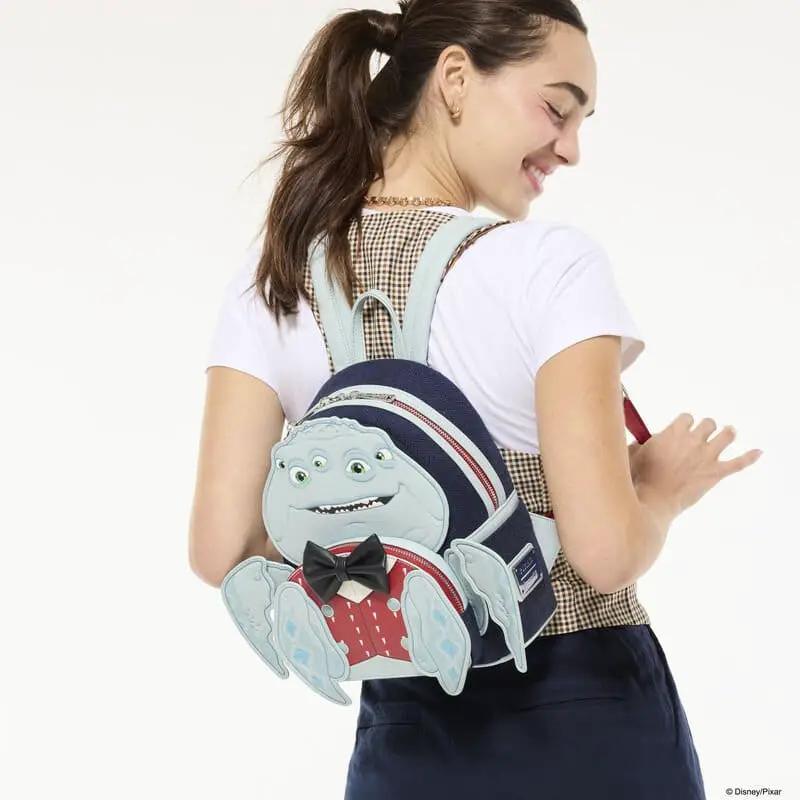 Mini Loungefly Monstruos S.A. Henry J. Waternoose backpack featuring a light-blue Waternoose design.