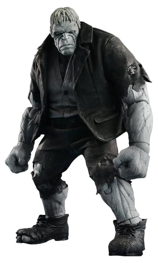 Solomon Grundy action figure by MEZCO TOYS, DC Comics One:12 Collective, gray-skinned character in a torn black suit.