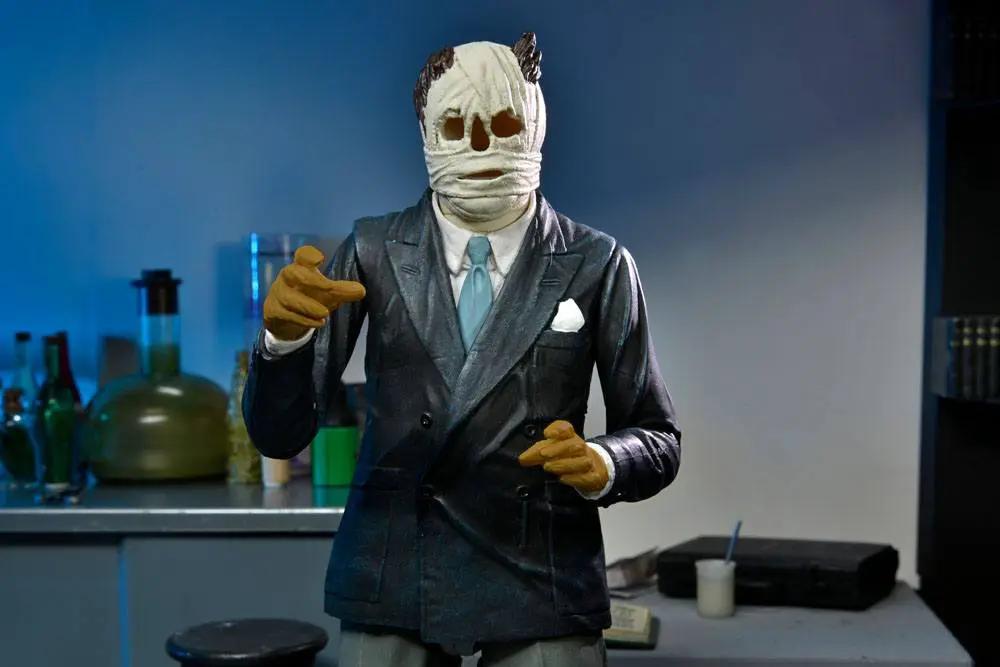 Figura de acción Universal Monsters The Invisible Man Ultimate, 18 cm, traje azul oscuro y cabeza vendada