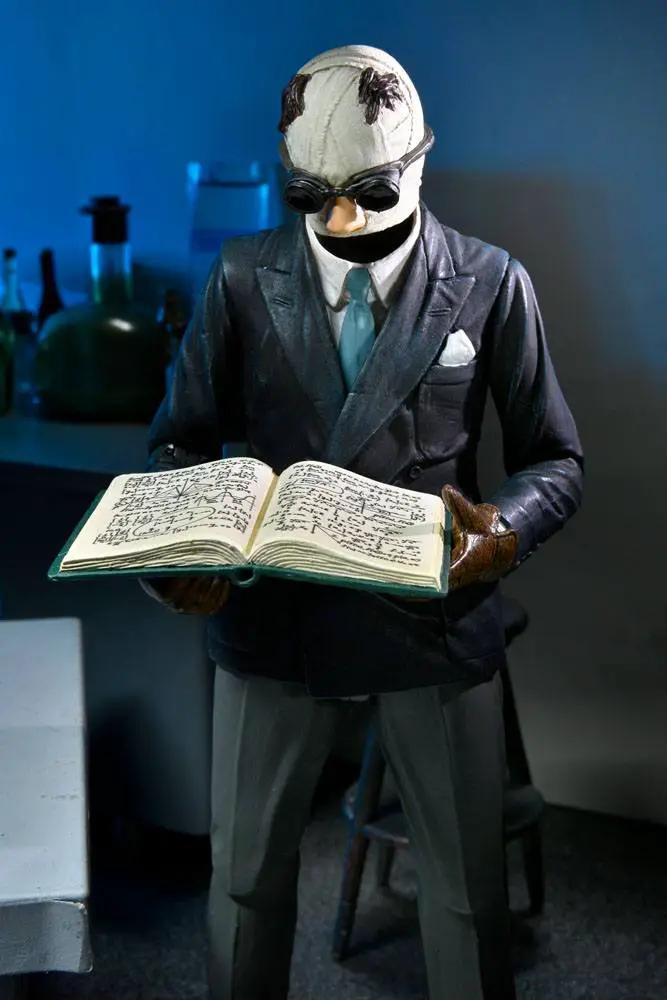 Figura de acción NECA Universal Monsters The Invisible Man, 18 cm, traje gris y cuaderno abierto