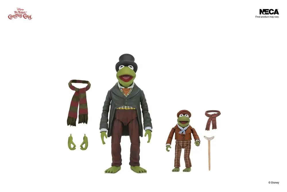 NECA pack de 2 figuras Muppets Navidad: Kermit como Bob Cratchit y Robin como Tiny Tim, 18 cm, con accesorios.