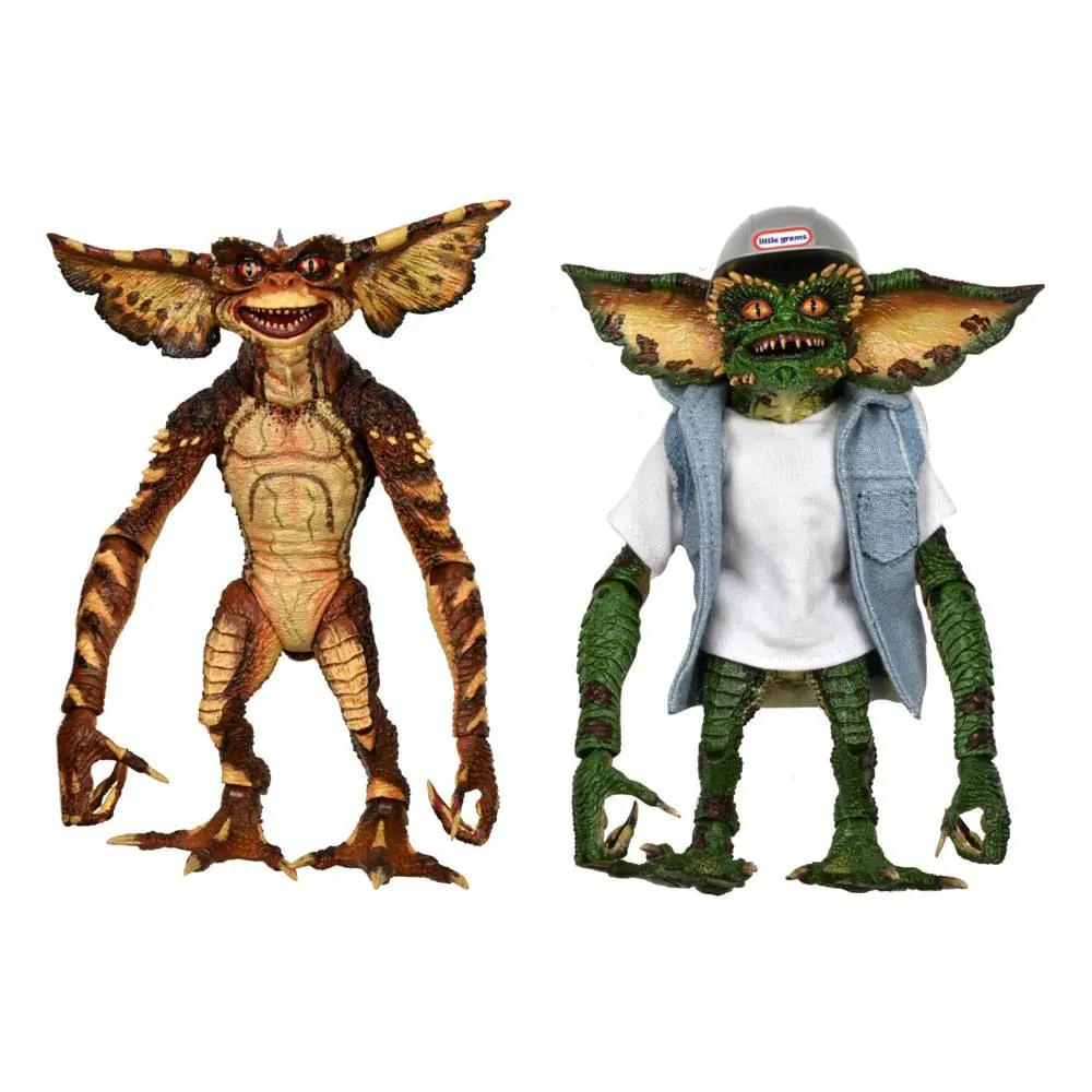 Gremlins NECA: 2 figuras Ultimate Demolition, 15 cm; una figura marrón y otra verde con camiseta blanca y chaleco.