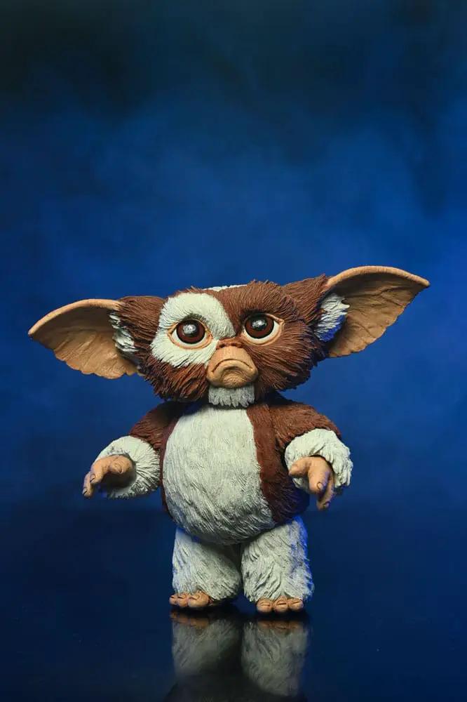 Gremlins Evolution of a Gremlin 40th Anniversary NECA figure, brown and white Mogwai with oversized ears