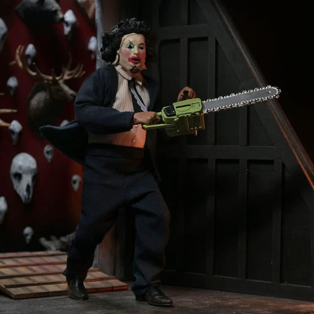 NECA Leatherface 20 cm action figure from Texas Chainsaw Massacre with green chainsaw, in a dark suit