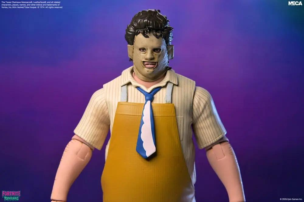 Figura de acción Leatherface NECA, Fortnitemares Fortnite, 18 cm, con delantal amarillo y corbata azul