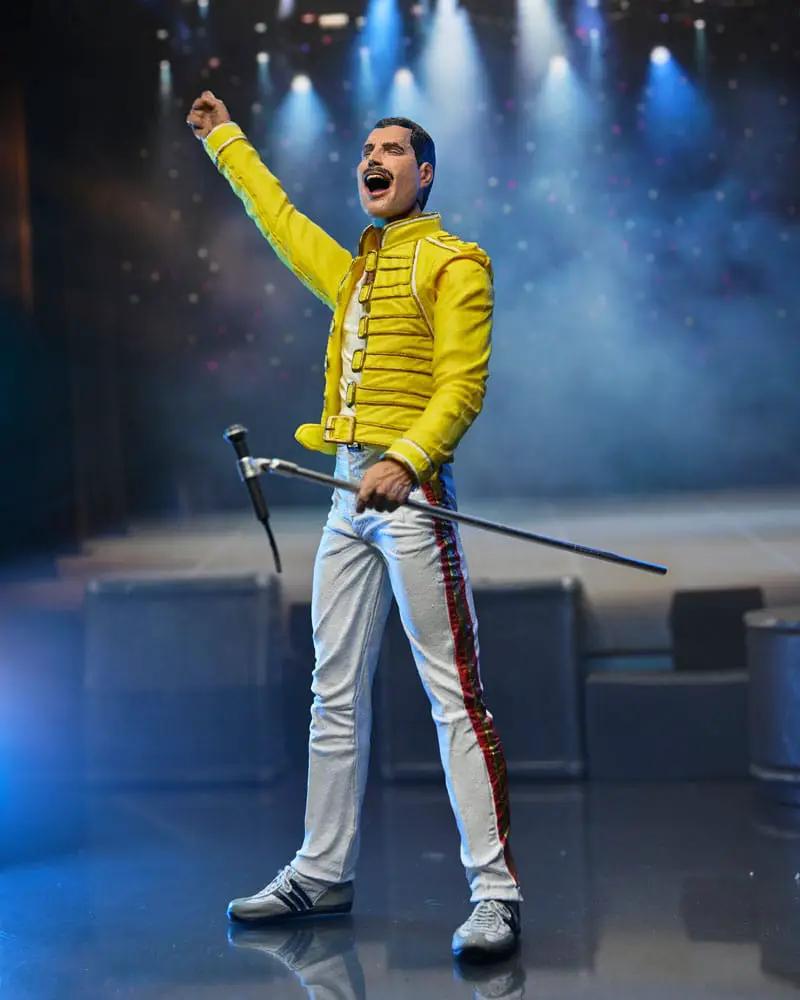 Freddie Mercury figure (NECA) in a yellow jacket with white pants, 18 cm, posed with a microphone stand
