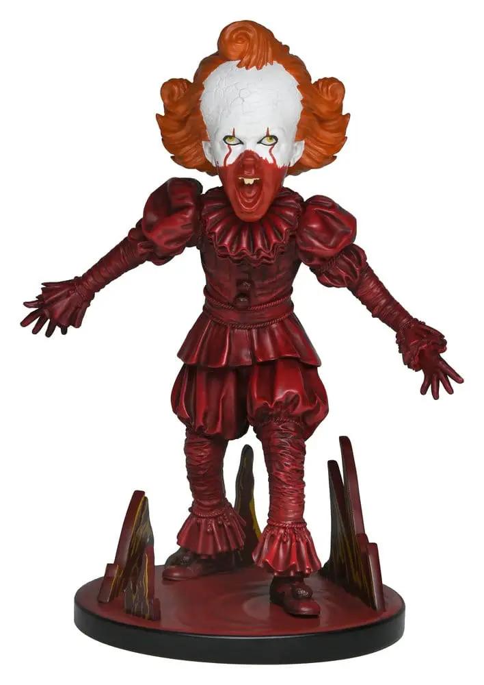 NECA It Pennywise head knocker action figure, 19 cm, red clown costume on display base.