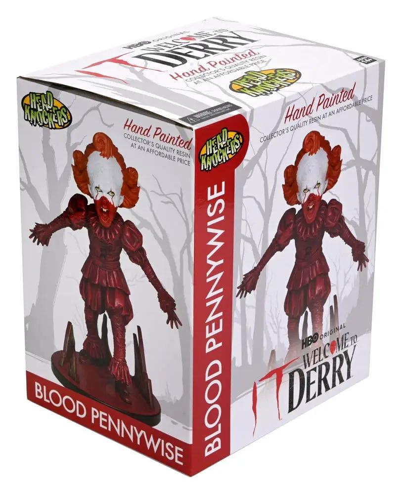 NECA Blood Pennywise Head Knocker action figure from IT: Welcome to Derry, red-clad Pennywise, 19 cm boxed.
