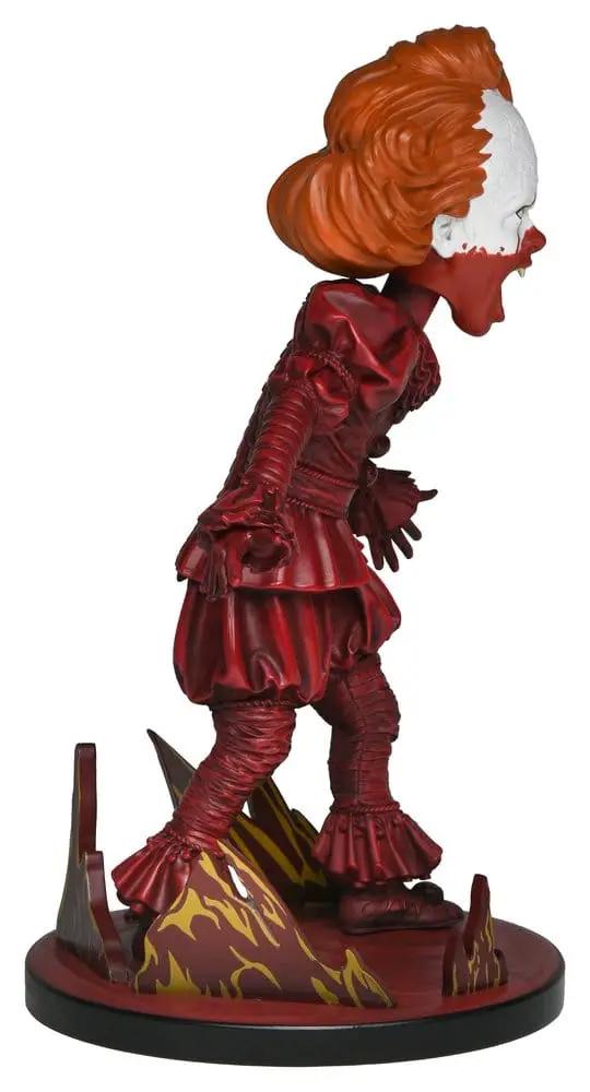 Pennywise head-knocker action figure by NECA, 19 cm, red suit and orange hair.