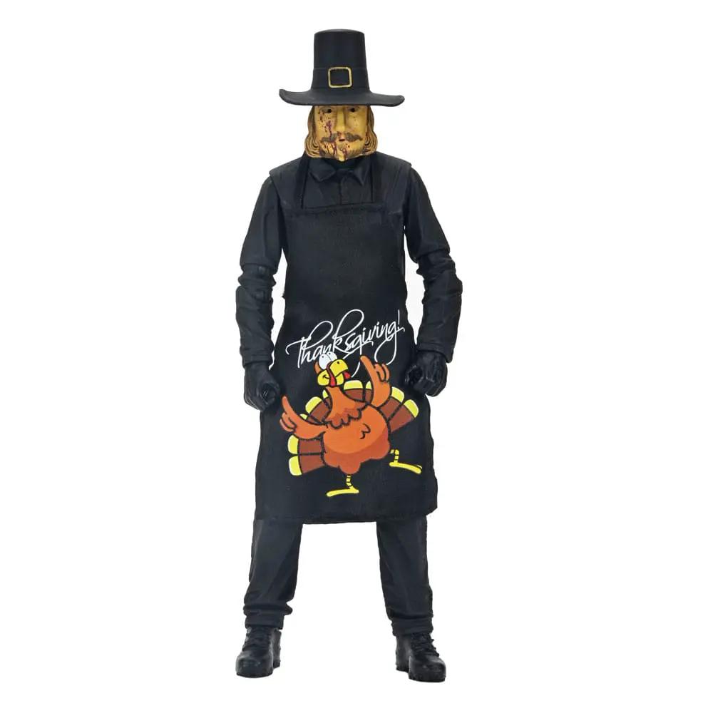 NECA Ultimate John Carver No Leftovers 18 cm figure in black outfit with Thanksgiving apron featuring a cartoon turkey.