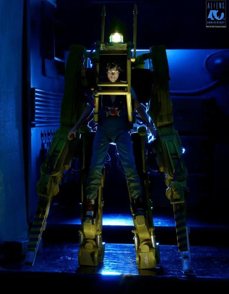 NECA Aliens Power Loader P-5000 action figure in yellow mech, blue-lit display, 40th Anniversary