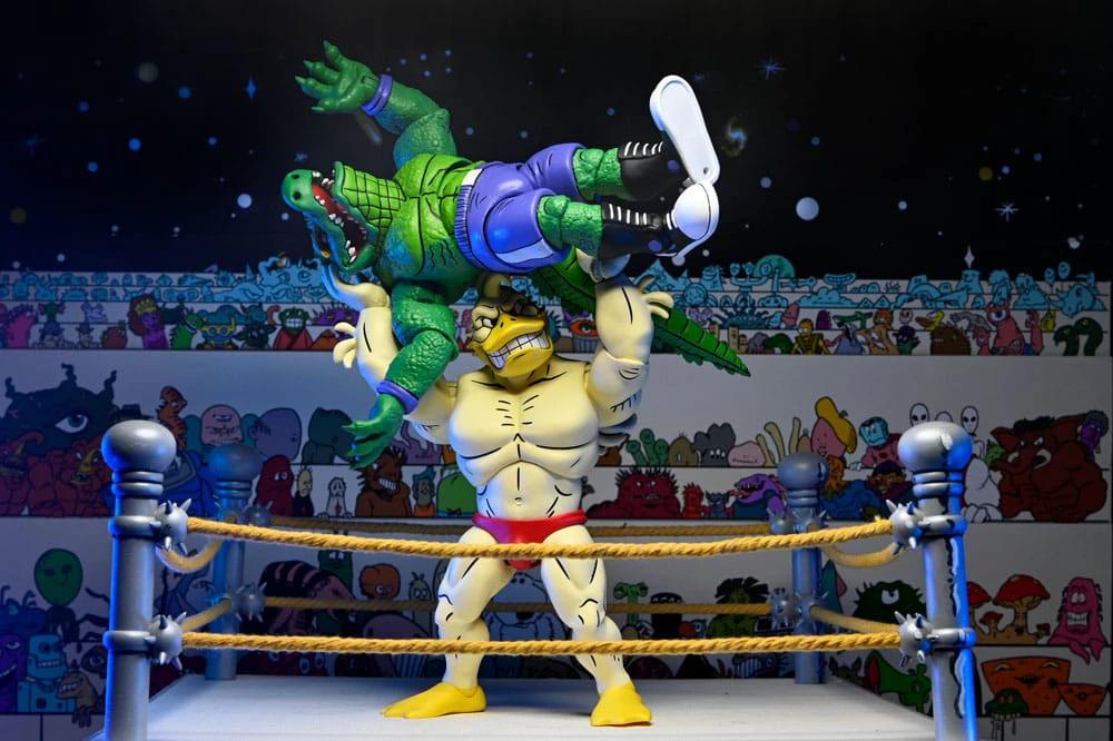 Action figures: Ace Duck (white) and Leatherhead (green) wrestling in a ring, TMNT Archie, 18 cm