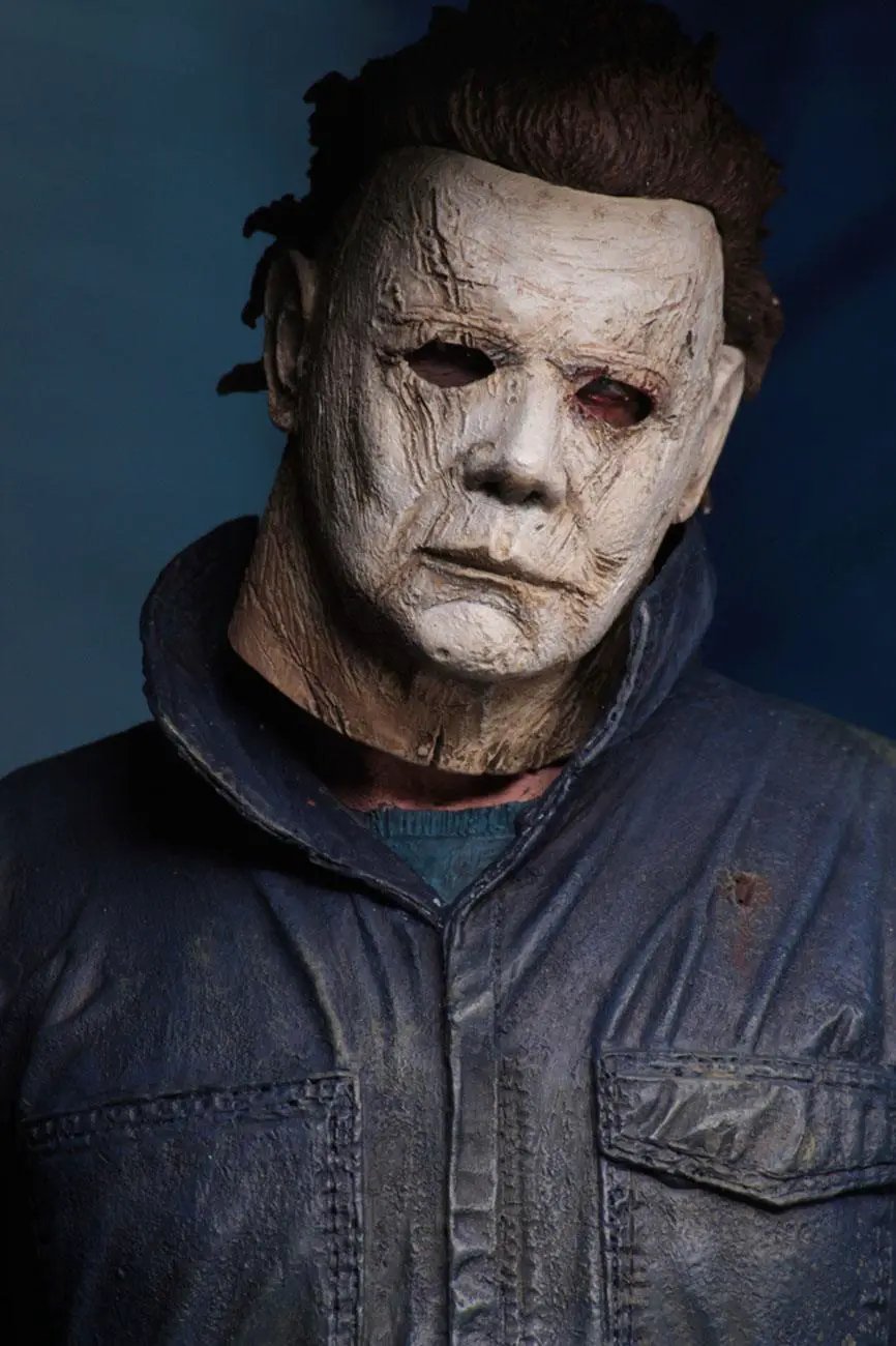 NECA Halloween 2018 Figura Ultimate Michael Myers, 18 cm action figure with pale mask and blue jacket.