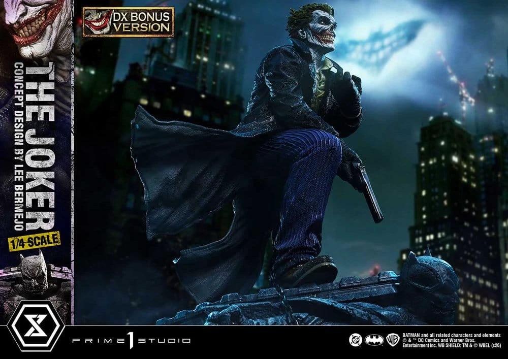 Prime 1 Studio DC Comics The Joker 1/4 Scale DX Bonus Version statue on rubble with gun, urban night backdrop