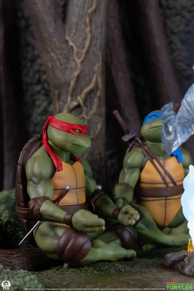 TMNT scale diorama figures by Premium Collectibles Studio; two turtles with red and blue masks sit in a forest scene.