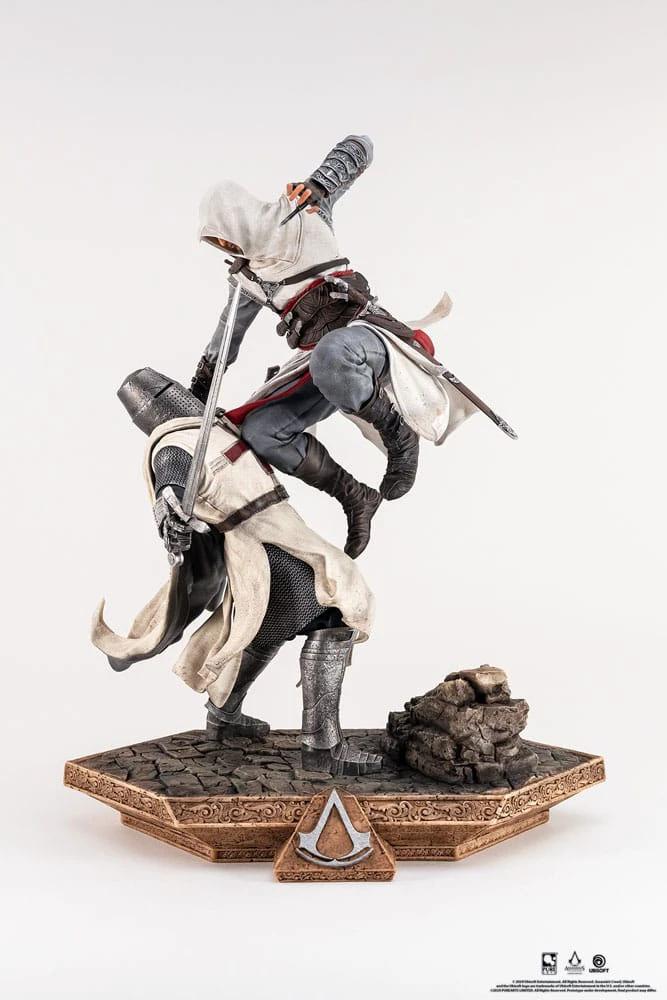 Assassin's Creed 1/6 scale diorama statue by PURE ARTS; two hooded assassins clash on a stone base with AC emblem.