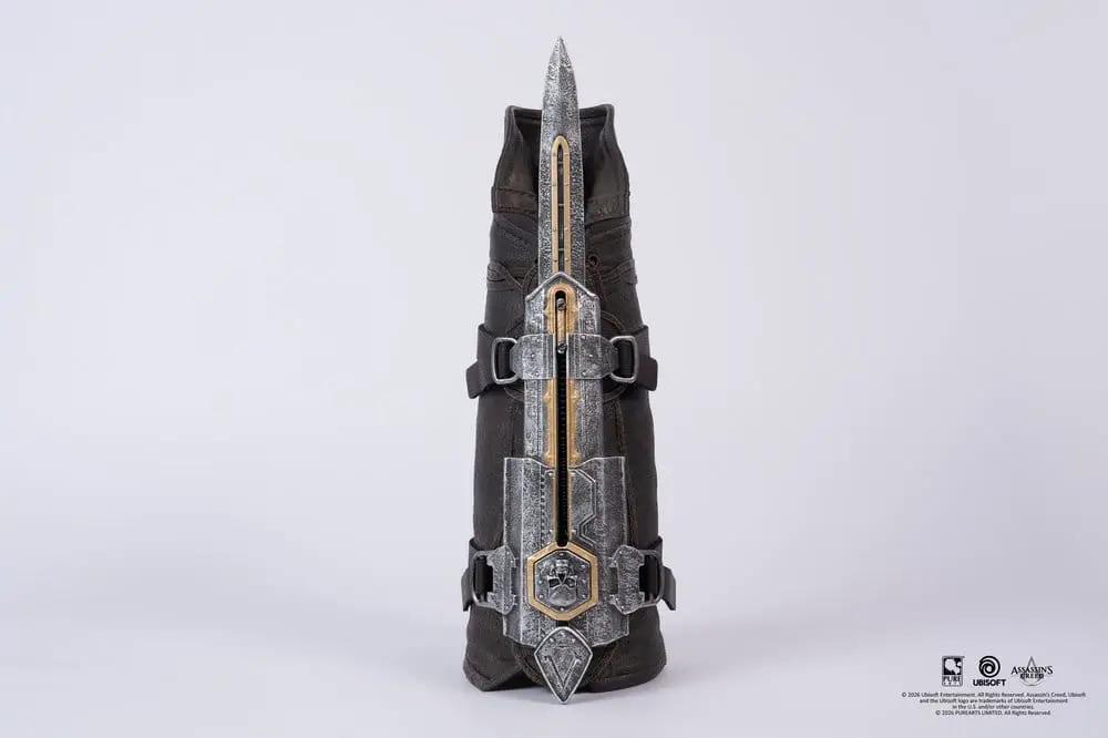Hidden Blade replica from Assassin’s Creed Black Flag by PURE ARTS; silver with gold accents and leather straps.