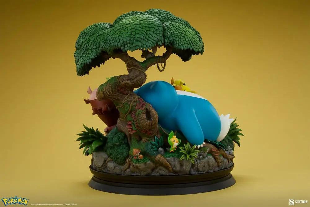 Pokémon Snorlax diorama figure 33 cm by SIDESHOW COLLECTIBLES; blue Snorlax on rocky base beneath a leafy tree
