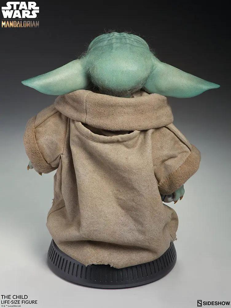 Star Wars The Child life-size statue by Sideshow Collectibles; back view of Baby Yoda in tan robe on black base