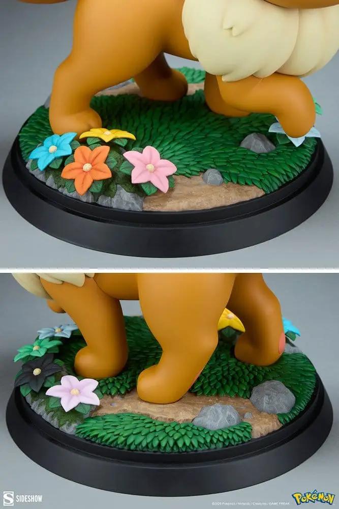 Figura Eevee de Pokémon a tamaño real (34 cm) por Sideshow Collectibles, base con césped y flores coloridas