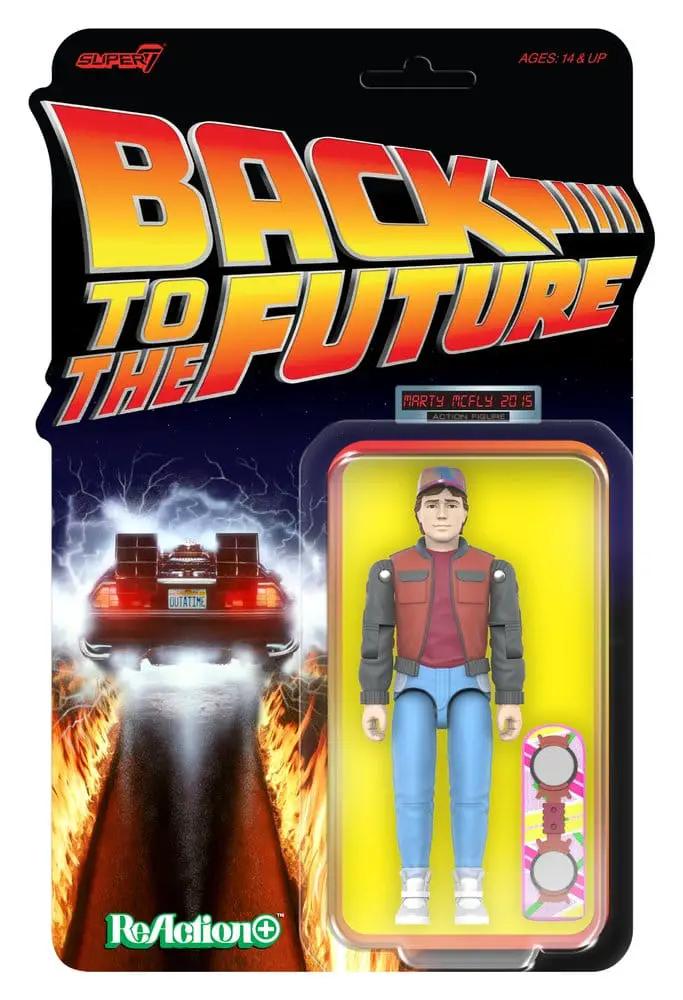 Figura de acción Marty McFly ReAction+ Wave 02 de Super7 en blister de Back to the Future; vest rojo y gris, jeans azules y tenis blancos, fondo amarillo.