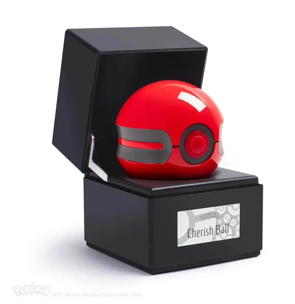 Pokémon Gloria Ball red diecast replica on a black display stand